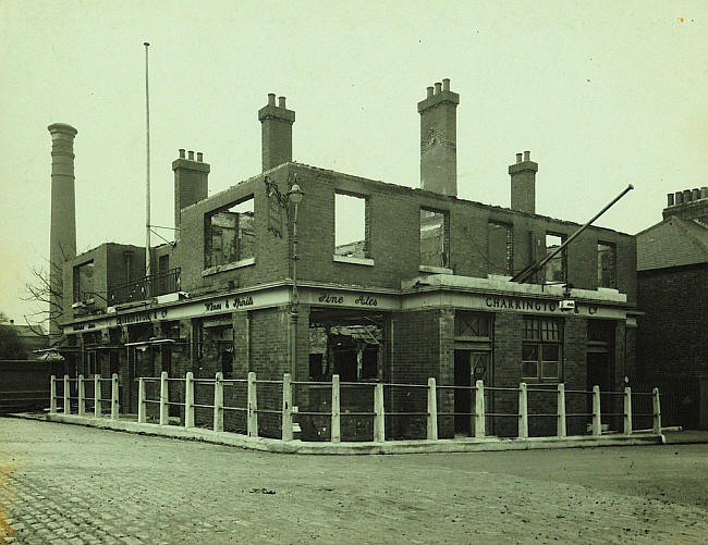 Old Bargehouse, viewed from Bargehouse Road, 1940, author unknown [https://pubshistory.com/EssexPubs/NorthWoolwich/barge.shtml].